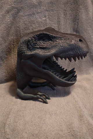 Wall mountable dino headset and controller holder