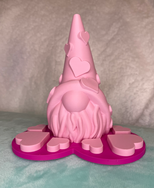 Gnome sitting on Heart